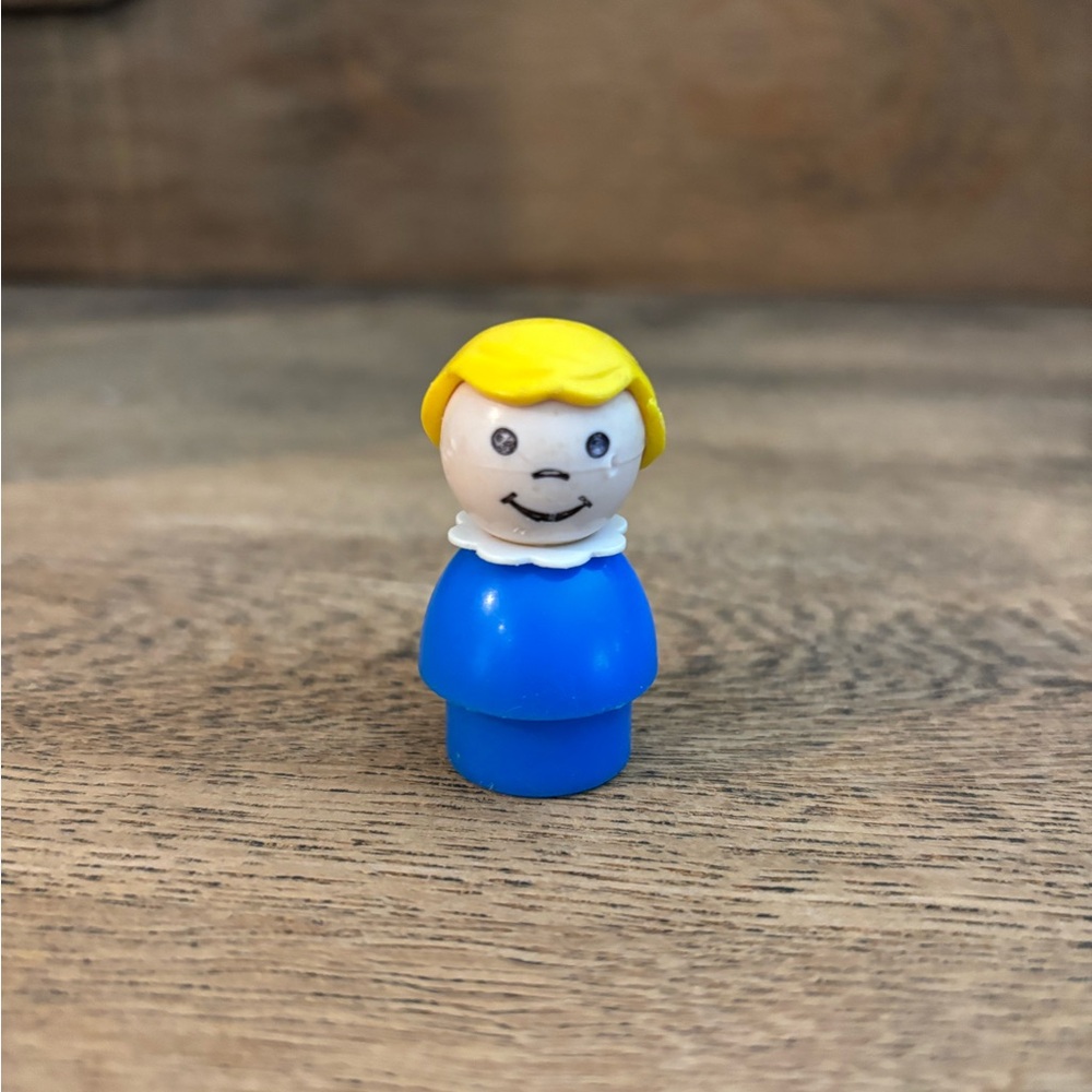 Fisher-Price Blue and Yellow Smiling Figure